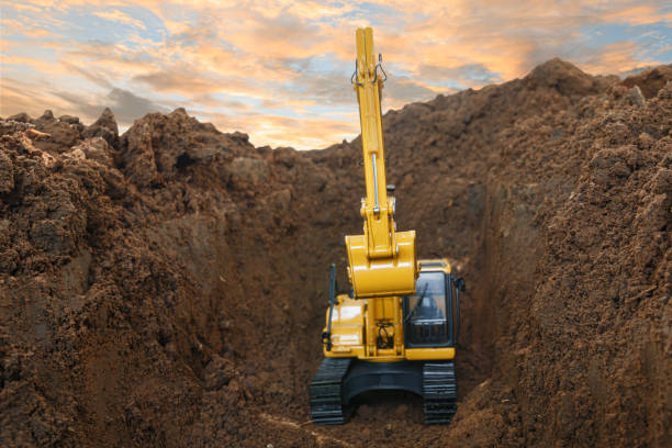 istock Selective focus ,Excavator with Bucket lift up are digging the soil in the construction site 2160207087