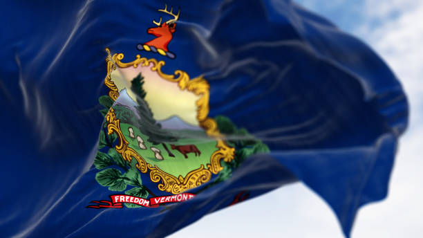 istock Vermont and the american flags waving in the wind 2160207171