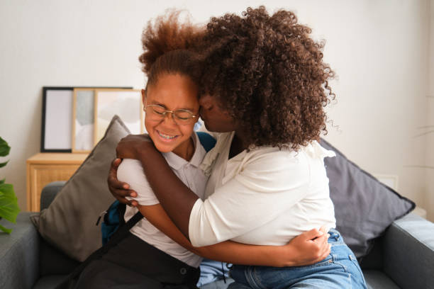 istock Mother is sharing a tender moment with her daughter before school 2160208005