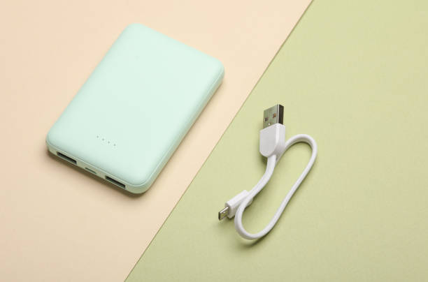 istock Plastic power bank mint green color on pastel background 2160208872
