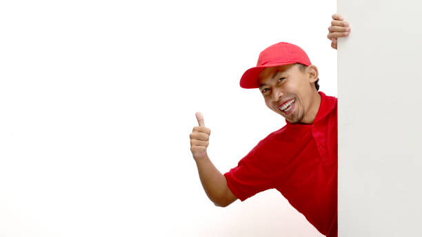 istock Asian Delivery Man Giving Thumbs Up 2160209242