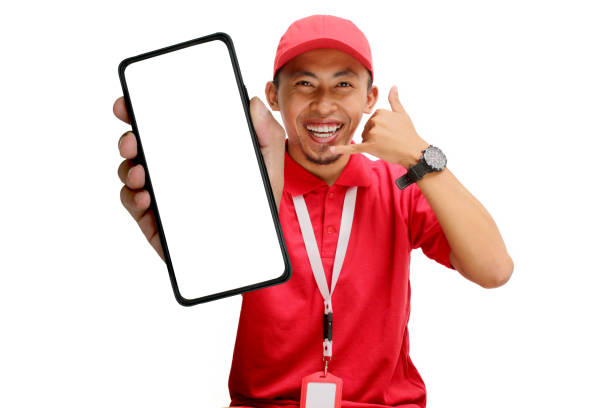 istock Asian Delivery Man Showing Blank Phone Screen with 'Call Me' Gesture 2160209563