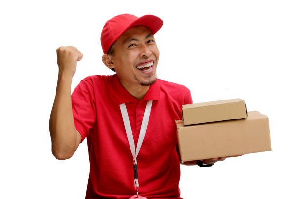 Asian Delivery Man Celebrating with YES Gesture and Cardboard Box