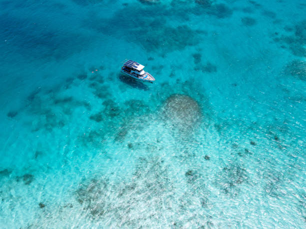 istock Boat in the ocean in Aruba 2160210977
