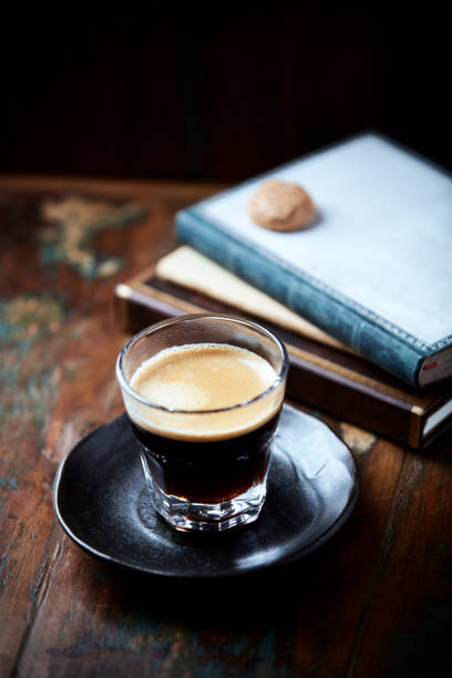 istock Coffee in glass cup on dark background. Close up. 2160211208