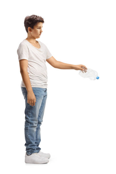 istock Teenage boy throwing a plastic bottle 2160211767