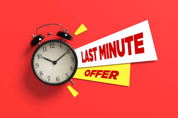 istock Last minute offer appearing on red background with alarm clock 2160216444