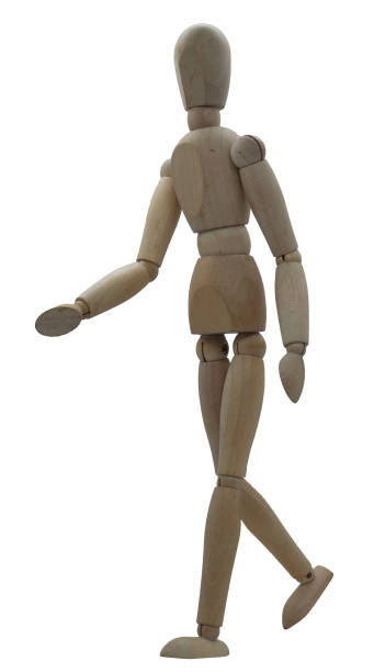 istock Wooden jointed figure posed as if walking 2160218781