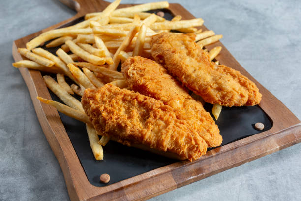 istock chicken nuggets, fries 2160220291