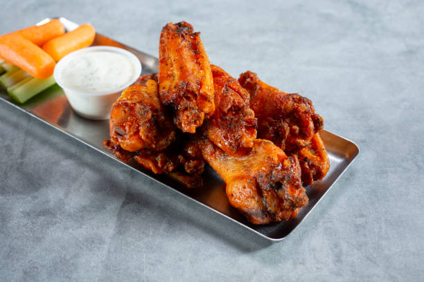 istock tray of Buffalo wings 2160220329