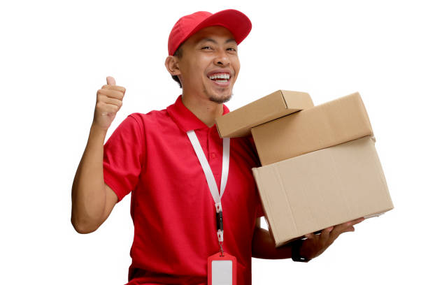 istock Asian Delivery Man Giving Thumbs-Up with Cardboard Box Parcel 2160222661