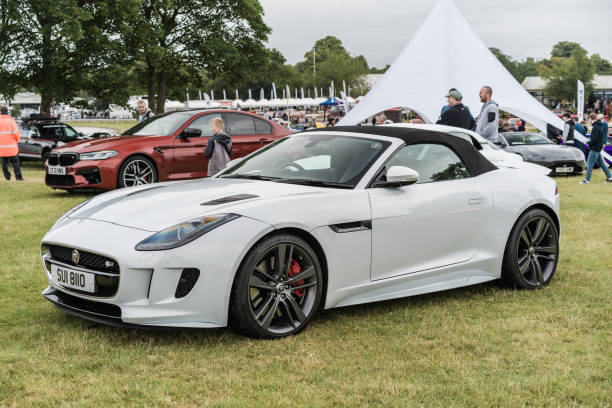 Jaguar F-Type SVR sports car driving on the street of Monte Carlo in the Grand Hotel Hairpin of the Monaco race track.