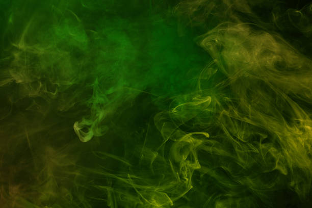 istock Green and pink steam on a black background. 2160224406