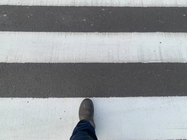 istock Foot on the Crosswalk 2160224687