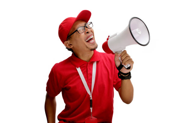 istock Asian Delivery Man Announcing Promo and Special Offers 2160226598