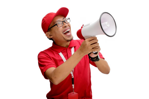 istock Asian Delivery Man Announcing Promo and Special Offers 2160226767