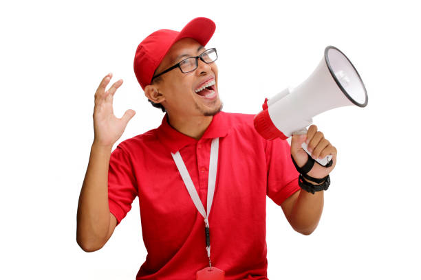 istock Asian Delivery Man Announcing Promo and Special Offers 2160226782