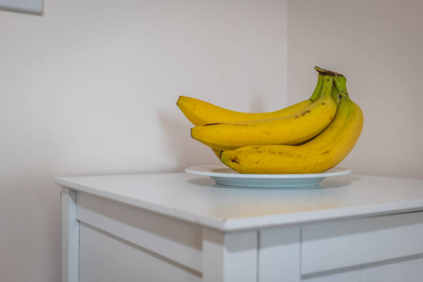 istock Fresh ripe banana fruit on corner table in hall 2160227206