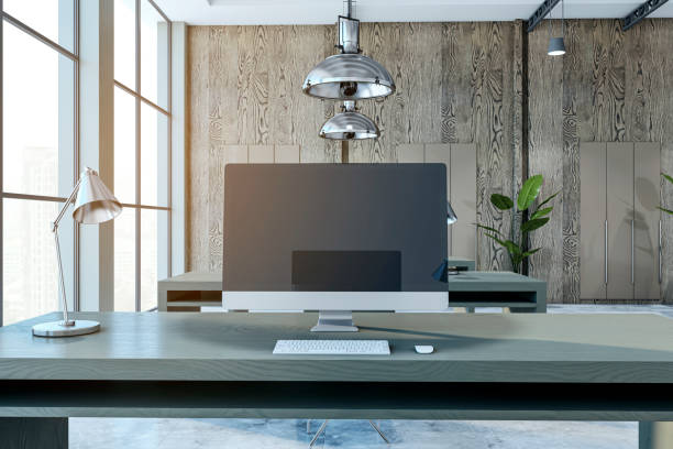 istock A modern office interior with a desk, computer, and decorative plants, in a realistic style against a wooden background, concept of a workplace. 3D Rendering 2160228807