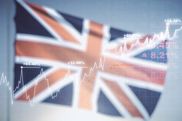 istock Multi exposure of virtual creative financial chart hologram on British flag and blue sky background, research and analytics concept 2160232419