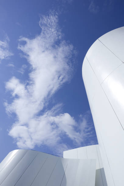 istock Construction of a white building with abstract shapes against a blue sky 2160236607