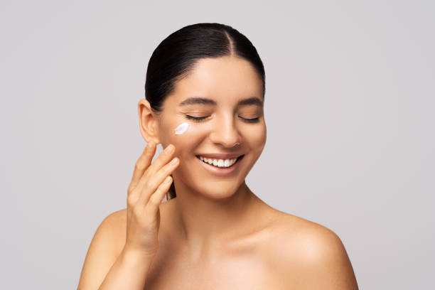 istock Skincare on fleek. Happy brunette with a glowing complexion and a winning smile. Ideal for beauty brands and self-care promotions 2160239207