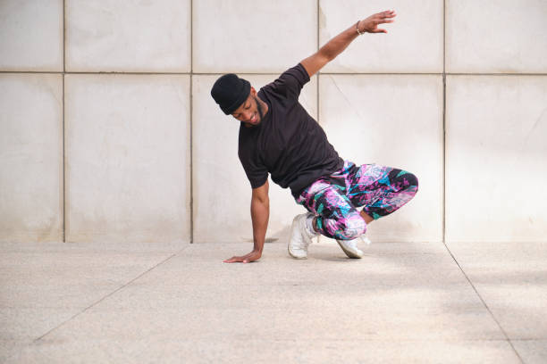 istock Young man breakdancing in the street is striking a pose 2160239738