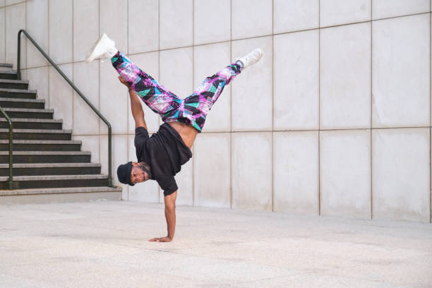 istock Young breakdancer balancing on one hand on the street 2160240167