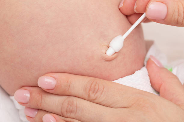 istock Mother Wipes Newborn Babys Navel 2160243171