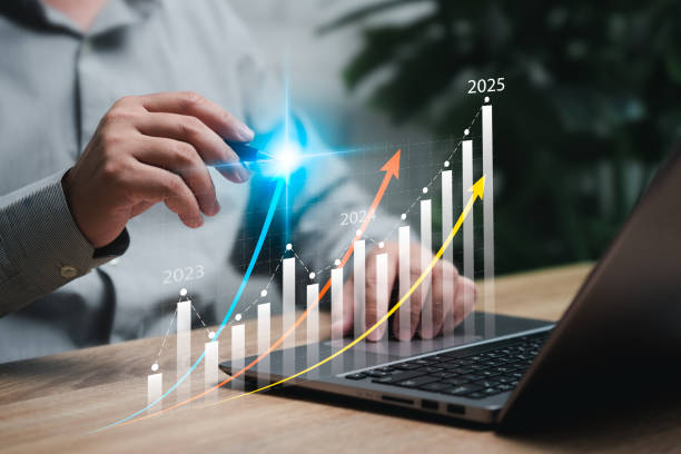 istock Business graphs statistics to analyze business potential 2025 concepts, Businessmen use laptop to compare growth graph forecast the future, Marketing targets growth optimize performance for profit. 2160247609