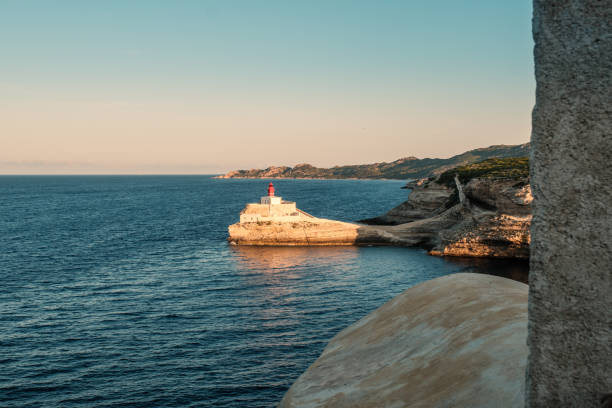 White Cliffs of Bonifacio. Corsica Bonifacio Coastal Drone Point of View Panorama towards the famous coastal steep white limestone - chalk cliffs towards the Mediterranean Sea close to the famous l’escalier du Roi d’Aragon staircase of Bonifacio. Bonifacio White Cliff Coast, Southern Corsica Coast, Cose du Sud, Corsica, France