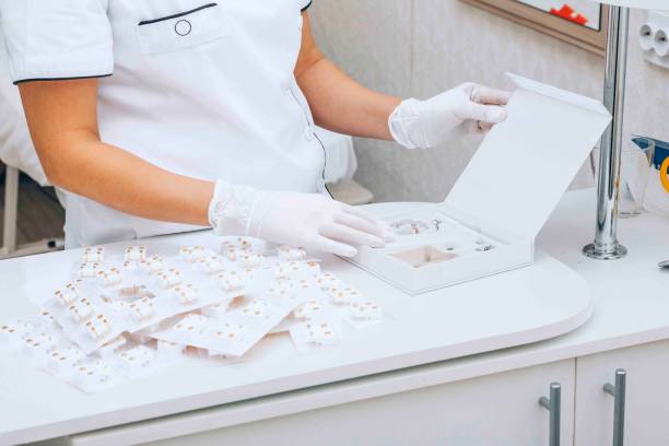 istock careful organization of earrings, ensuring each pair is sterile and ready for use 2160259332