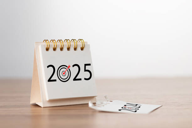 istock 2025 Happy New year background. Turns over a calendar sheet. Setup objective target business cost and budget planning of new year concept. year change from 2024 to 2025. 2160264933