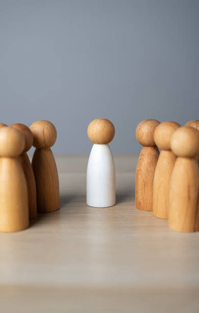 istock Chosen among the people. Business management, human resources. Collaboration. An authoritative leader and a crowd of people figures. 2160268675