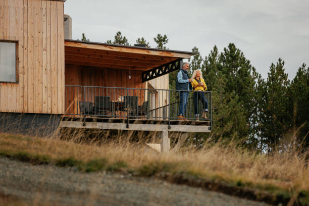 istock Couple enjoying themselves on a mountain home deck 2160272721