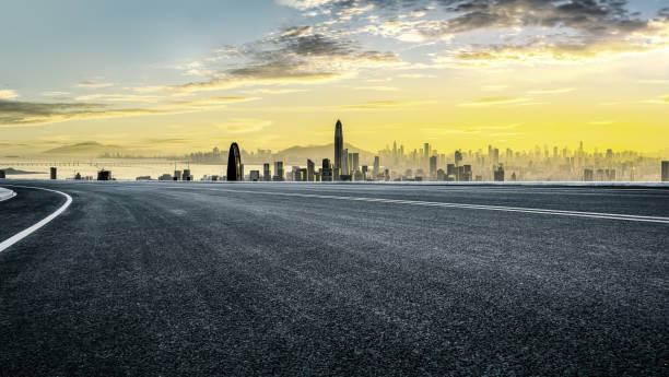 istock Empty asphalt road and cityscape in modern city 2160273744