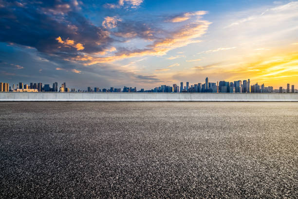 Empty asphalt road and cityscape in modern city