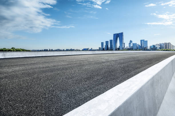 istock Empty asphalt road and cityscape in modern city 2160274015