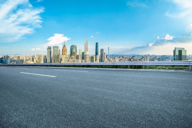 istock Empty asphalt road and cityscape in modern city 2160274213