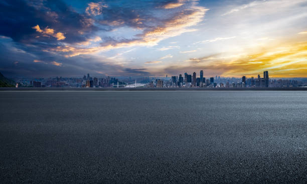istock Empty asphalt road and cityscape in modern city 2160274228