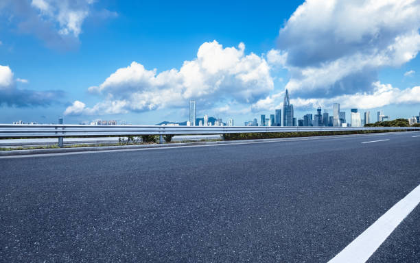 istock Empty asphalt road and cityscape in modern city 2160274735