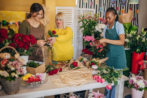 istock Florists working together to design stunning bouquets 2160274799