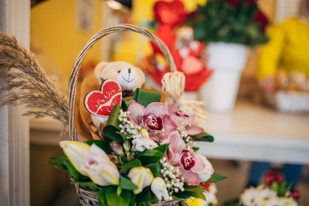 Pictured a flower basket in a white background.