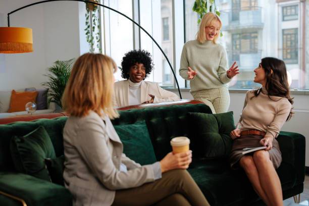 istock Coworkers in an office lounge 2160276449