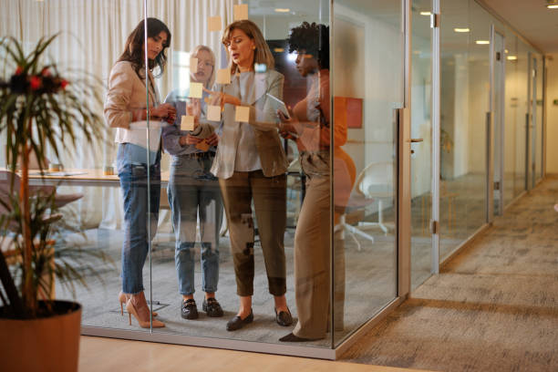 istock Businesswomen planning with sticky notes 2160276483