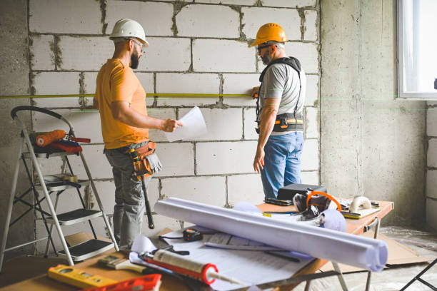 istock workers are doing repairs in the apartment 2160279590