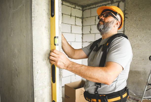 istock worker doing renovations in an apartment 2160283635
