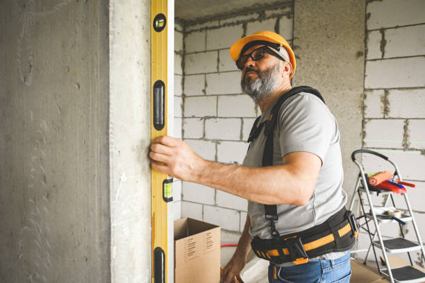 istock worker doing renovations in an apartment 2160284964