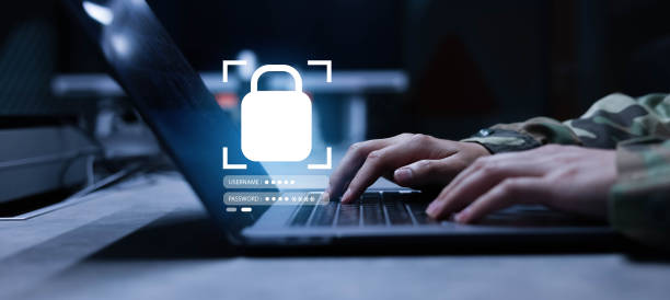 close up operator soldier hand using laptop with virtual cyber security and password to access on private software program system in workplace station for military technology concept