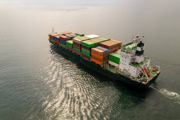 istock Large container ship at sea. Aerial top view of cargo container ship vessel import export container sailing. 2160293032